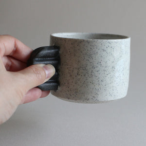 Speckled Cup with Contrast Black Handle
